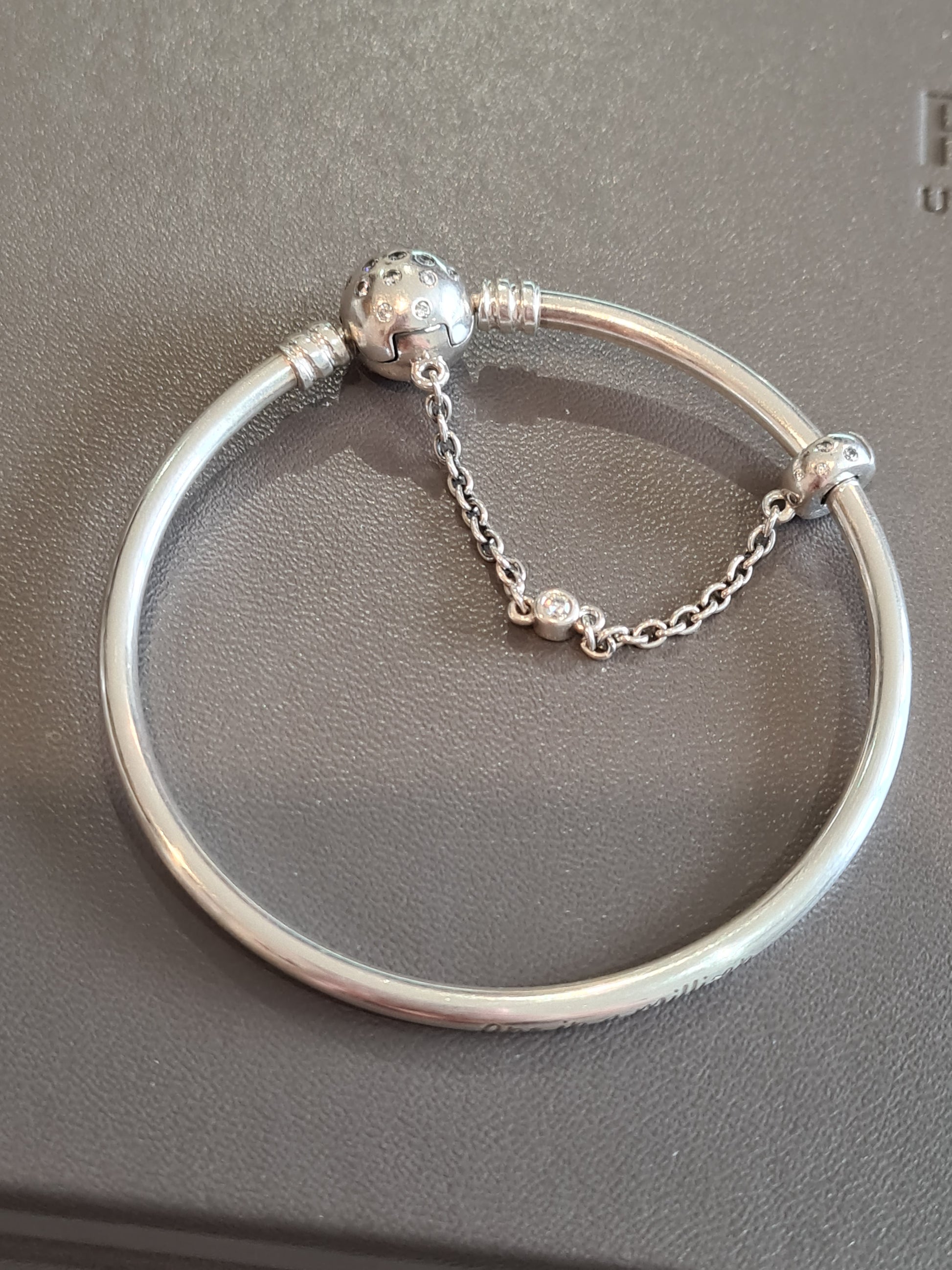 My first real beach find. Pandora sterling bracelet with 11