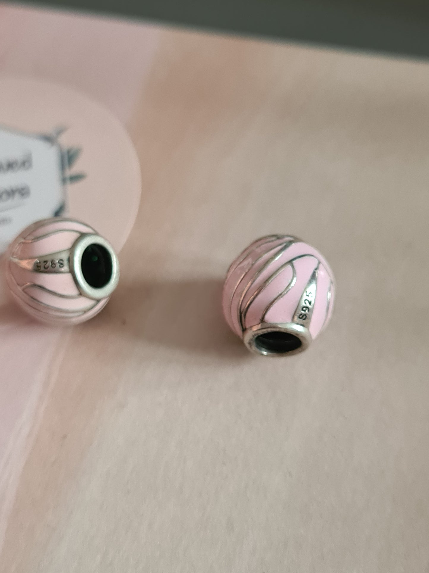 Sterling Silver Pink Enamel Ball Charms With Striking Green Stones