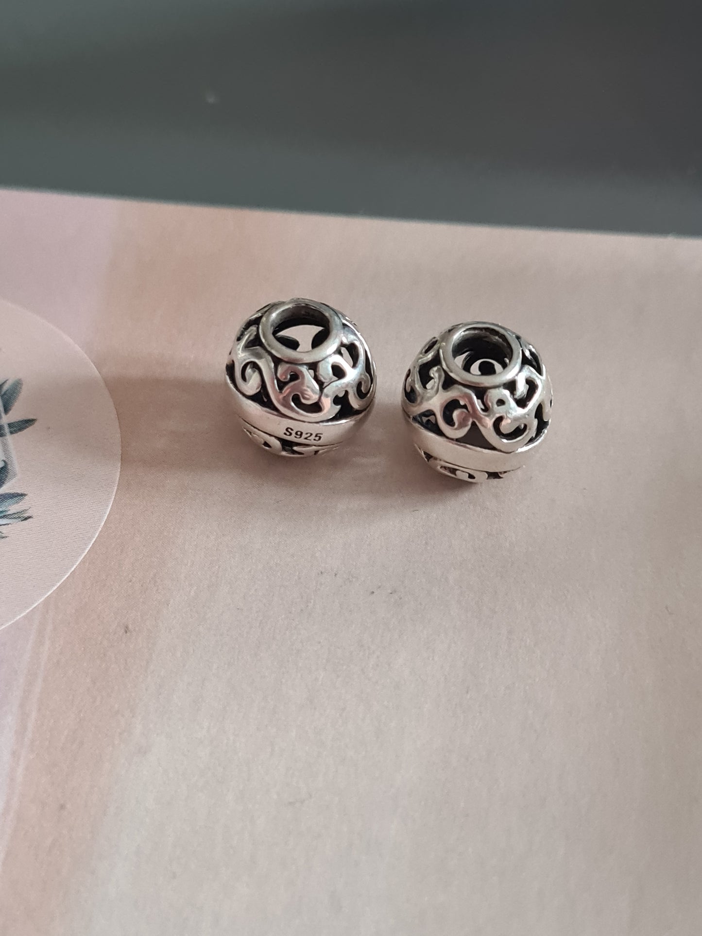 Silver Pair of Openwork Swirl Charms