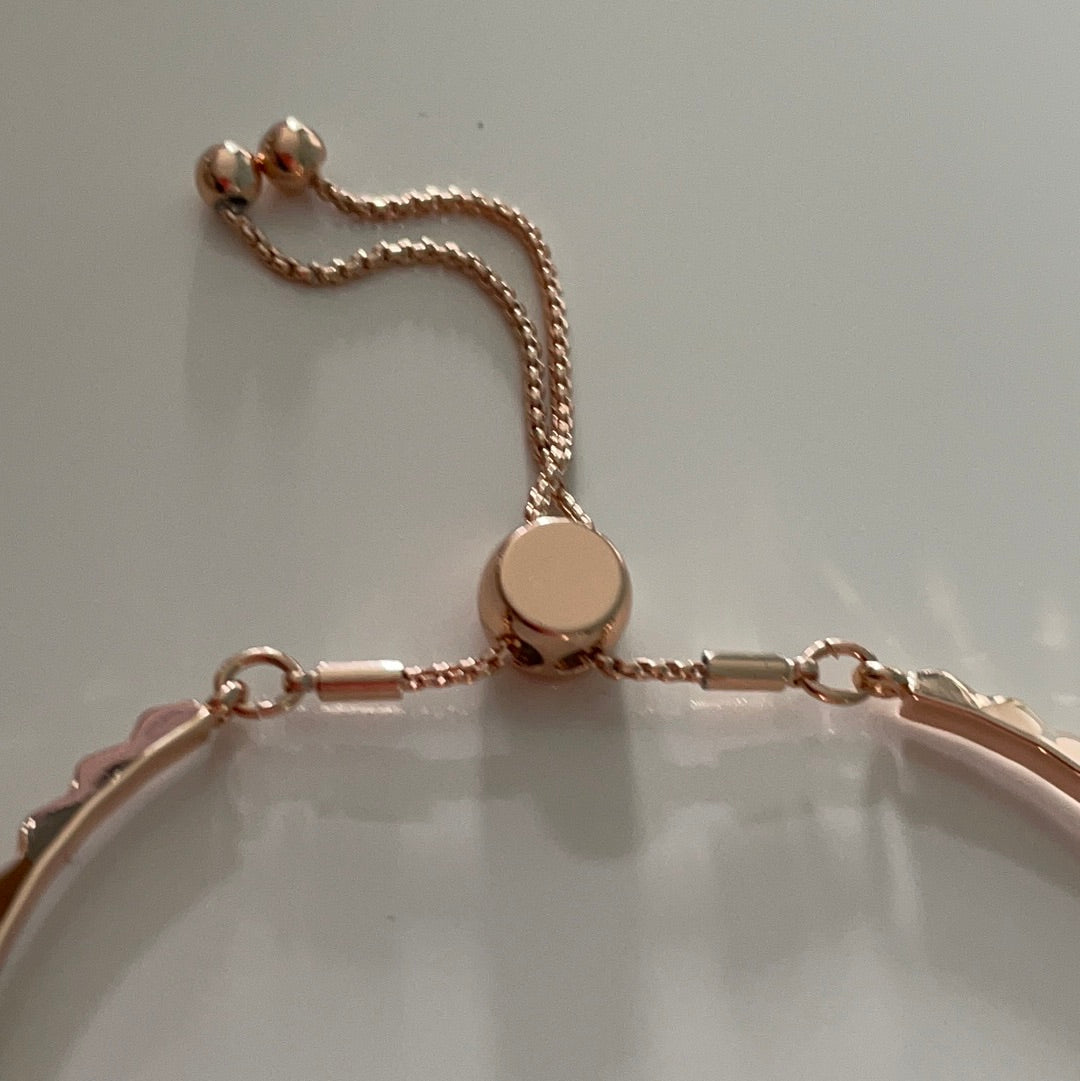 Brand New Metal Buckley Rose Gold Colour Adjustable Bangle With Raised Triangle Details