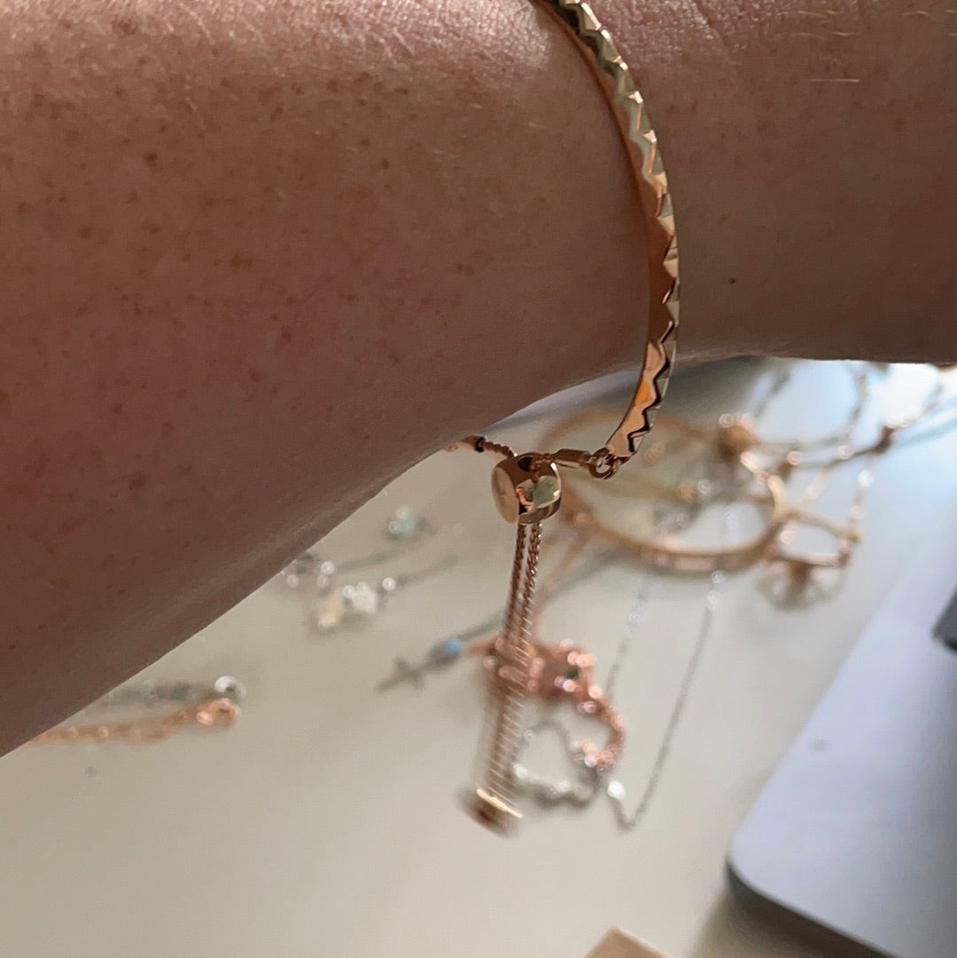 Brand New Metal Buckley Rose Gold Colour Adjustable Bangle With Raised Triangle Details