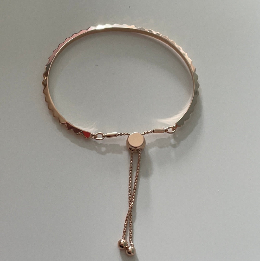 Brand New Metal Buckley Rose Gold Colour Adjustable Bangle With Raised Triangle Details